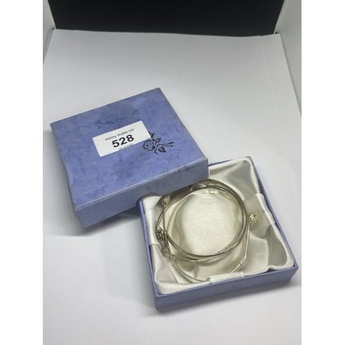 528 - THREE MARKED SILVER BANGLES IN A PRESENTATION BOX