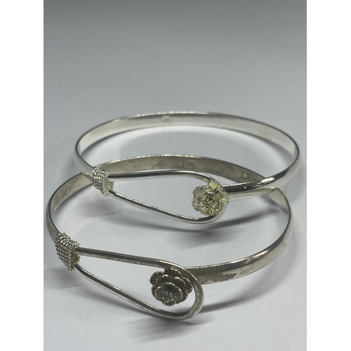 528 - THREE MARKED SILVER BANGLES IN A PRESENTATION BOX