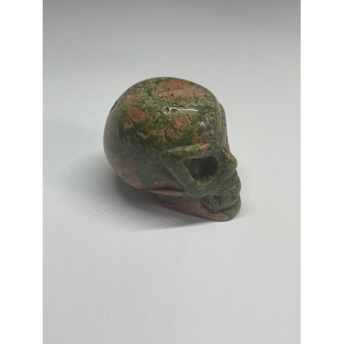 533 - A CARVED AGATE SKULL