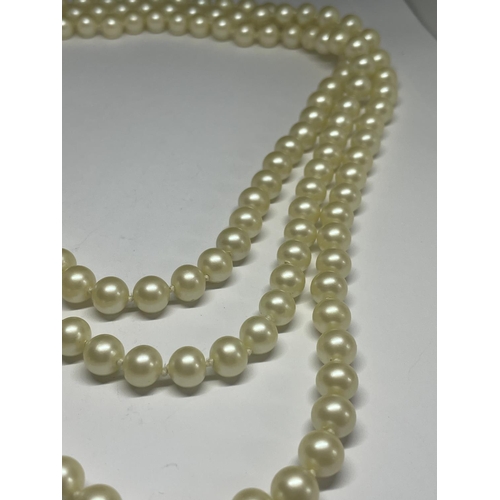 543 - A STRING OF PEARLS