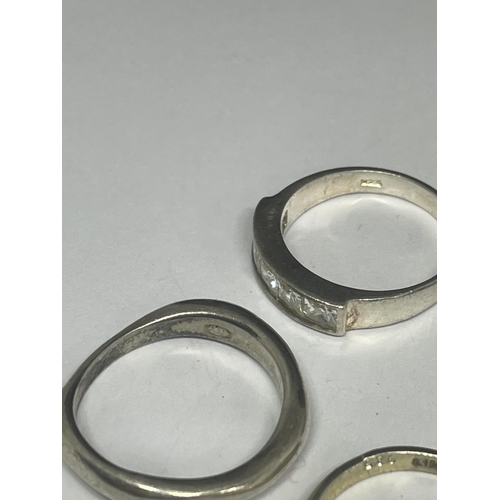 548 - FIVE VARIOUS SILVER RINGS