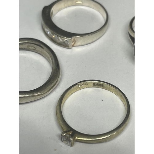 548 - FIVE VARIOUS SILVER RINGS