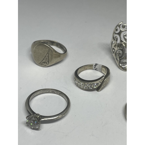 556 - FIVE VARIOUS MARKED SILVER RINGS