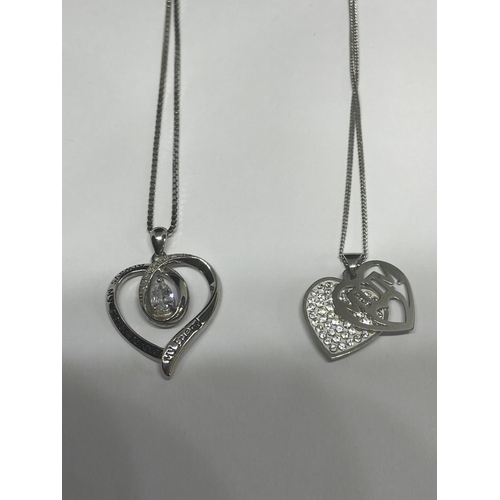 568 - THREE MARKED SILVER NECKLACES WITH PENDANTS