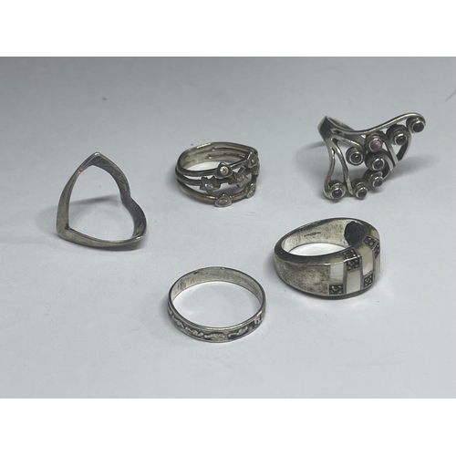 579 - FIVE VARIOUS MARKED SILVER RINGS