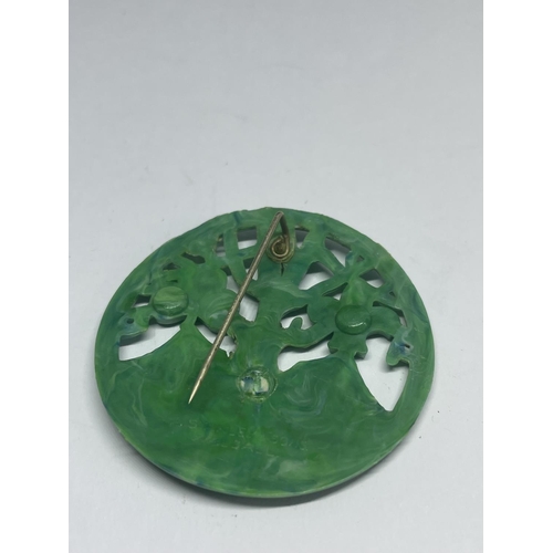 593 - A GREEN BAKELITE BROOCH MARKED BEAUDESERT 1938