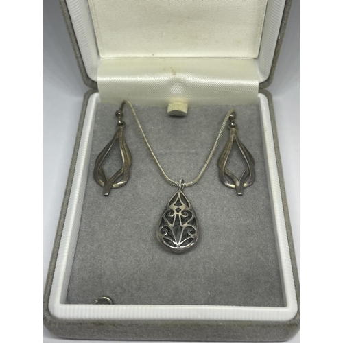 603 - A MARKED SILVER NECKLACE WITH PENDANT AND A APIR OF SILVER EARRINGS IN A PRESENTATION BOX