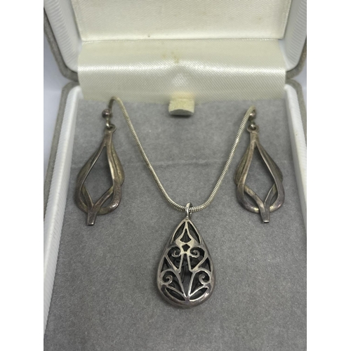 603 - A MARKED SILVER NECKLACE WITH PENDANT AND A APIR OF SILVER EARRINGS IN A PRESENTATION BOX