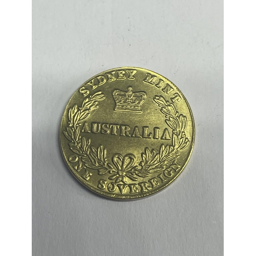 613 - A YELLOW METAL AUSTRALIAN COIN