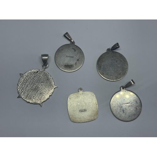 633 - FIVE VARIOUS SILVER PENDANTS