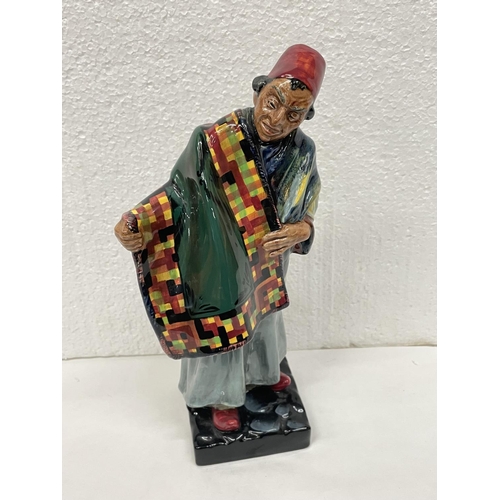 311 - A ROYAL DOULTON FIGURE CARPET SELLER HN 1464