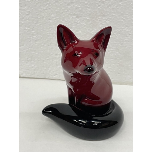 314 - A DOULTON FLAMBE SITTING FOX