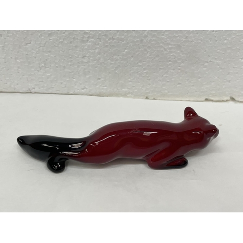 316 - A DOULTON FLAMBE LYING DOWN FOX