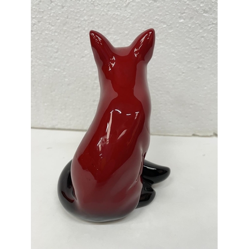 318 - A DOULTON FLAMBE SITTING FOX