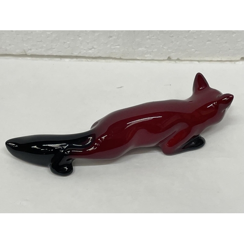 321 - A DOULTON FLAMBE LYING DOWN FOX