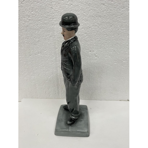 341 - A ROYAL DOULTON FIGURE CHARLIE CHAPLIN HN 2771