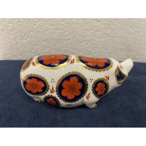 365 - A ROYAL CROWN DERBY PIG WITH GOLD COLOURED STOPPER