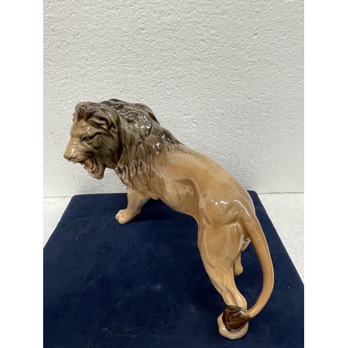 376 - A LARGE BESWICK FIGURE OF A LION