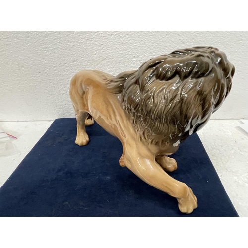 376 - A LARGE BESWICK FIGURE OF A LION