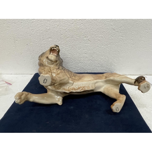 376 - A LARGE BESWICK FIGURE OF A LION