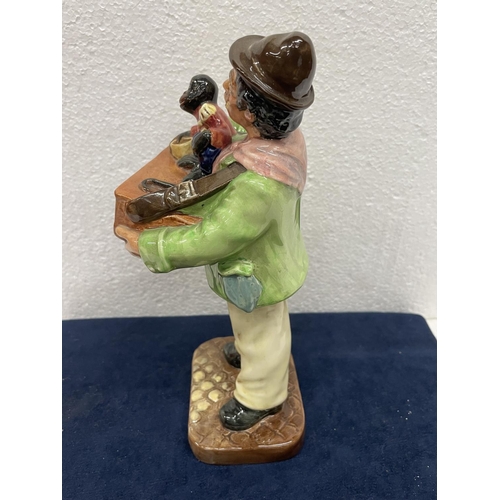 377 - A ROYAL DOULTON FIGURE THE ORGAN GRINDER HN 2173