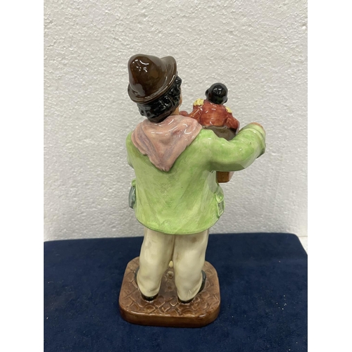 377 - A ROYAL DOULTON FIGURE THE ORGAN GRINDER HN 2173