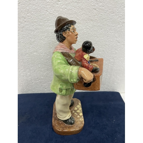 377 - A ROYAL DOULTON FIGURE THE ORGAN GRINDER HN 2173