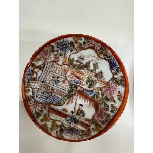 43 - A PAIR OF ORIENTAL SMALL PLATES WITH HAND PAINTED SCENE