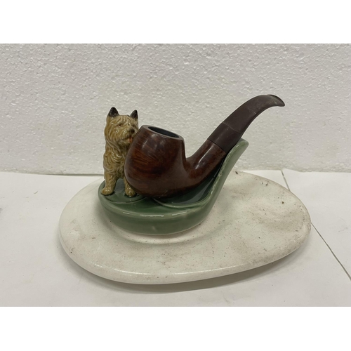 441 - A WADE DOG PIPE STAND WITH PIPE AND BASE