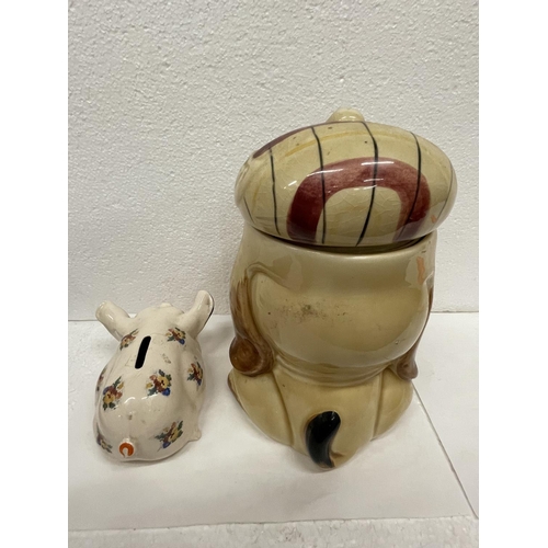 452 - TWO PRICE BROTHERS ITEMS TO INCLUDE A DOG BISCUIT BARREL AND A PIG MONEY BOX