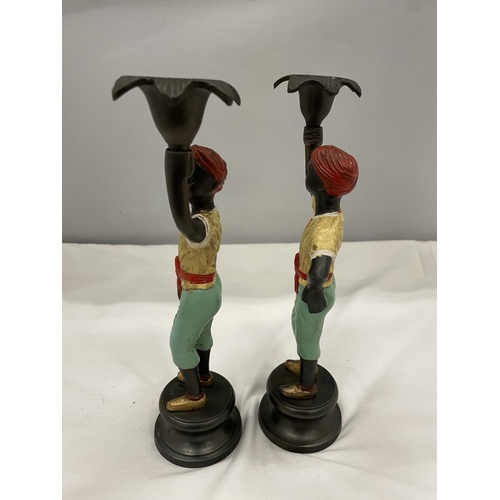 6 - A PAIR OF COLD PAINTED BERGMAN STYLE CANDLESTICKS