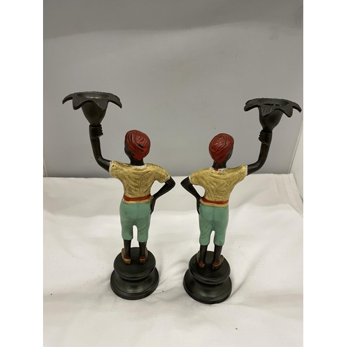 6 - A PAIR OF COLD PAINTED BERGMAN STYLE CANDLESTICKS