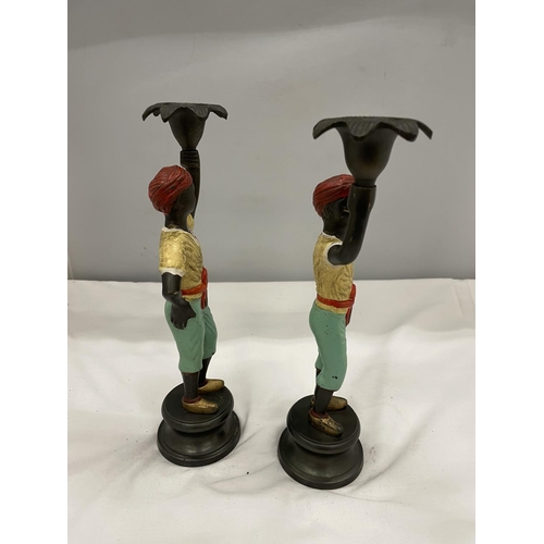 6 - A PAIR OF COLD PAINTED BERGMAN STYLE CANDLESTICKS