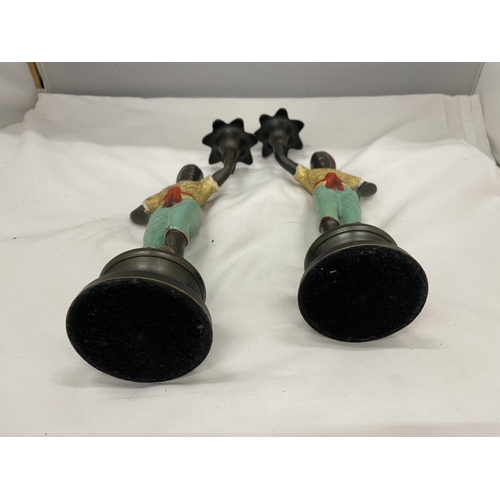 6 - A PAIR OF COLD PAINTED BERGMAN STYLE CANDLESTICKS