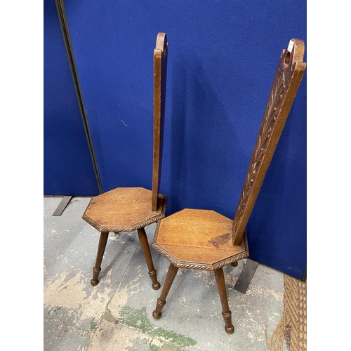 60A - A PAIR OF CARVED OAK SPINNING CHAIRS