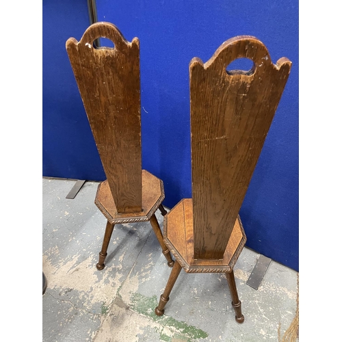 60A - A PAIR OF CARVED OAK SPINNING CHAIRS