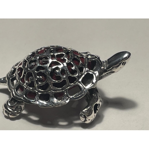 641 - A MINATURE SILVER TORTOISE PIN CUSHION