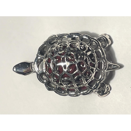 641 - A MINATURE SILVER TORTOISE PIN CUSHION