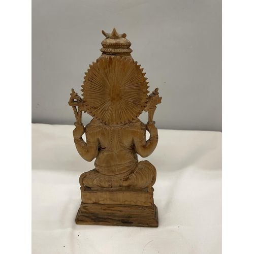 7 - A CARVED WOOD GANESHA FIGURE