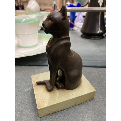 142 - AN EGYPTIAN STYLE SPHYNX CAT ON A BASE HEIGHT 13CM