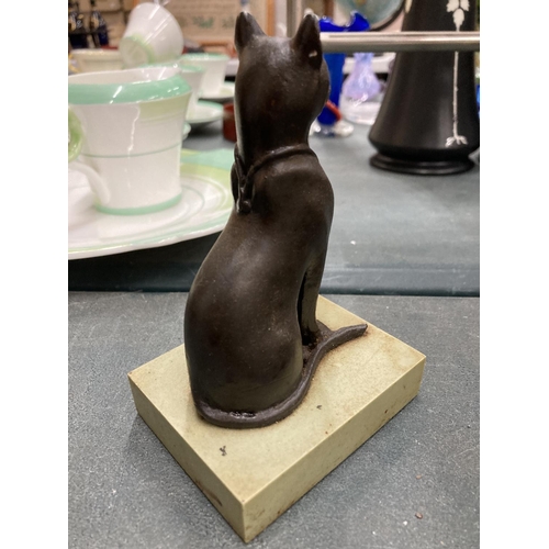 142 - AN EGYPTIAN STYLE SPHYNX CAT ON A BASE HEIGHT 13CM