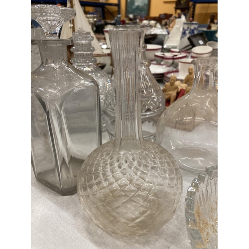 166 - A COLLECTION OF GLASSWARE TO INCLUDE A NUMBER OF DECANTERS TO INCLUDE HOBNAIL, CUT GLASS, ETC PLUS V... 