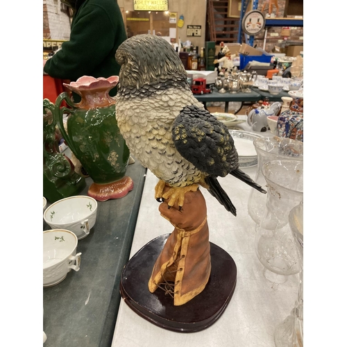 169 - A JULIANA COLLECTION RESIN FIGURE OF A KESTREL ON A WOODEN PLINTH 49CM HIGH