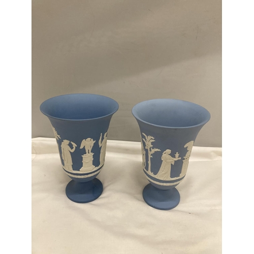 193 - A PAIR OF WEDGWOOD POWDER BLUE JASPERWARE VASES HEIGHT 18.5CM