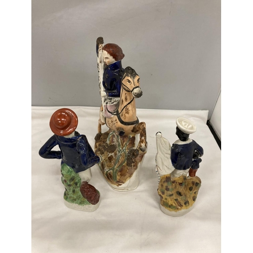 200 - THREE STAFFORDSHIRE FIGURES - A HUNTSMAN ON HORSE AND TWO SAILORS