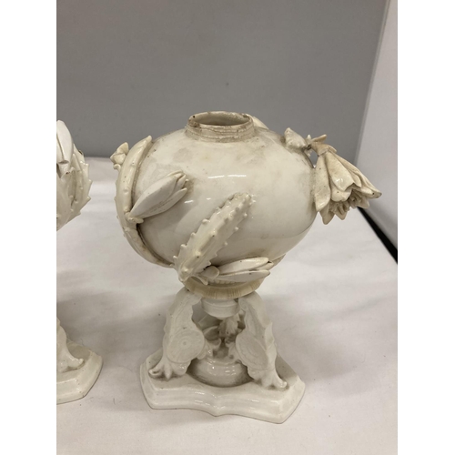 210 - A PAIR OF ANTIQUE POSSIBLY PASTILLE BURNERS IN CREAM PORCELAIN WITH FLORAL DESIGN HEIGHT 18CM