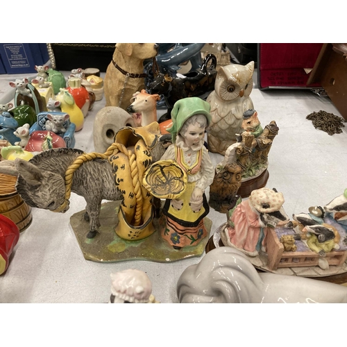 212 - A QUANTITY OF CERAMIC ANIMALS TO INCLUDE A GROUP OF DOLPHINS, DOGS, LEONARDO FIGURES, OWLS, ETC - SO... 