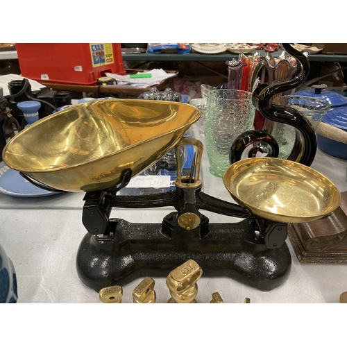 218 - A SET OF VINTAGE LIBRA CAST AND BRASS SCALES WITH WEIGHTS