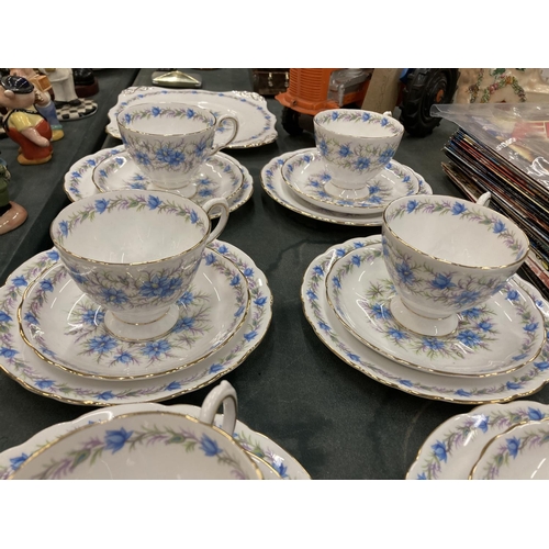 225 - A TUSCAN CHINA 'LOVE IN THE MIST' PART TEASET TO INCLUDE A CAKE PLATE, CUPS, SAUCERS, SIDE PLATES, C... 