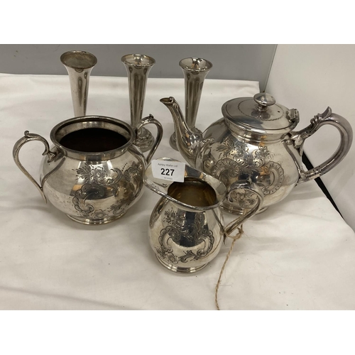 227 - A THREE PIECE VINTAGE ETCHED SILVER PLATED TEA SET TO INCLUDE TEAPOT, SUGAR BOWL AND CREAM JUG PLUS ... 